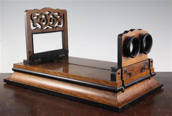 A Victorian parcel ebonised walnut stereoscope and graphoscope slide viewer, length 17.5in.